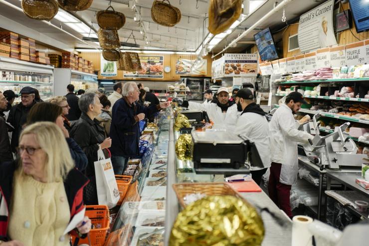 People shop at Zabar’s supermarket in New York City.