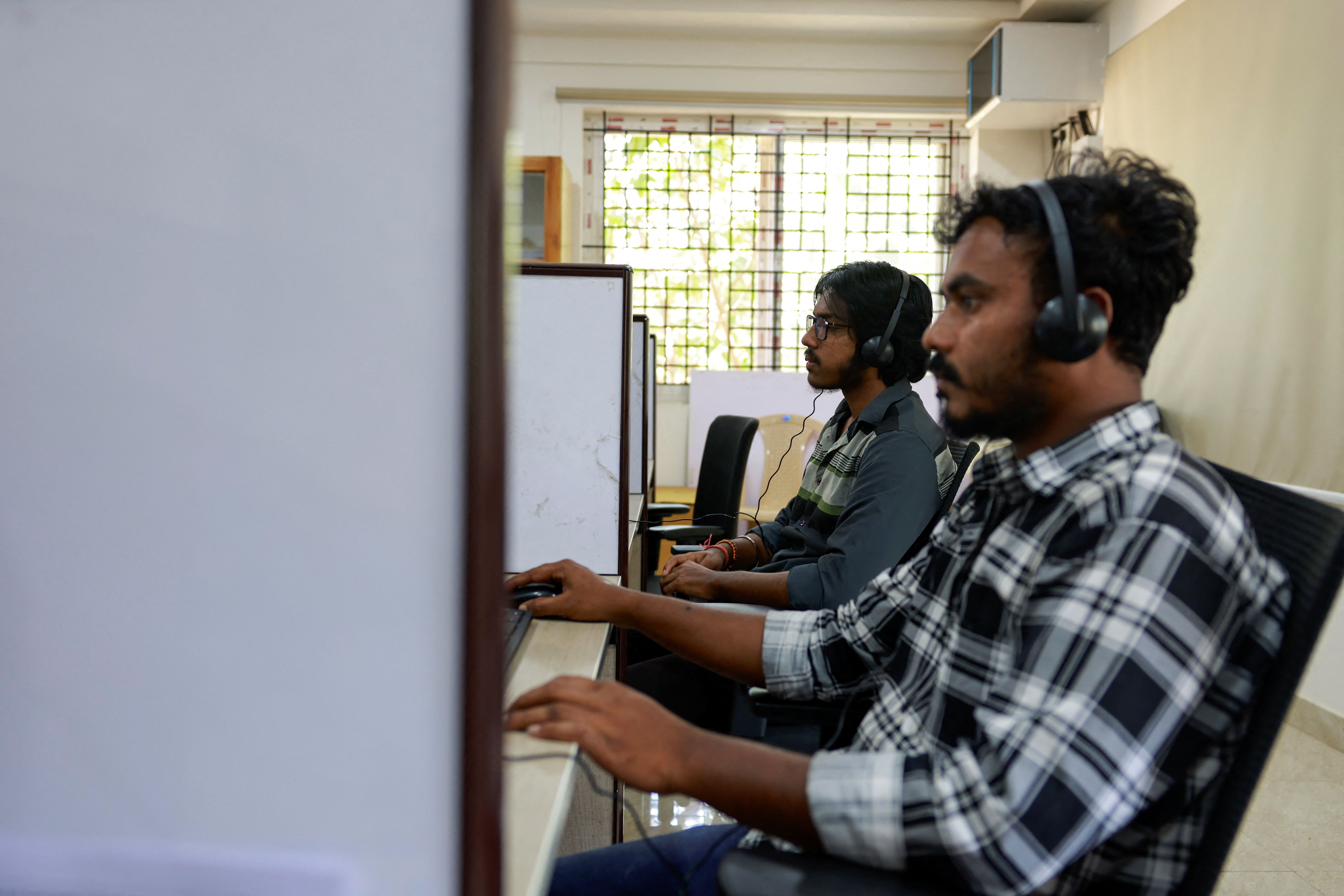 Officials at a call center in Bengaluru, India. 