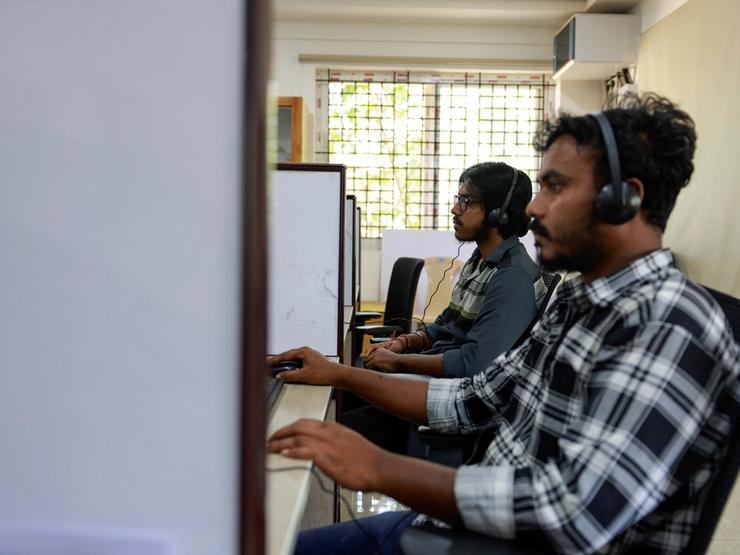 Officials at a call center in Bengaluru, India.