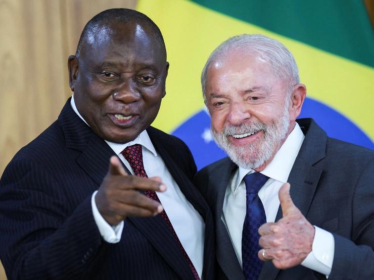 South Africa’s President Cyril Ramaphosa and Brazil’s President Luiz Inacio Lula da Silva react during a joint press statement.