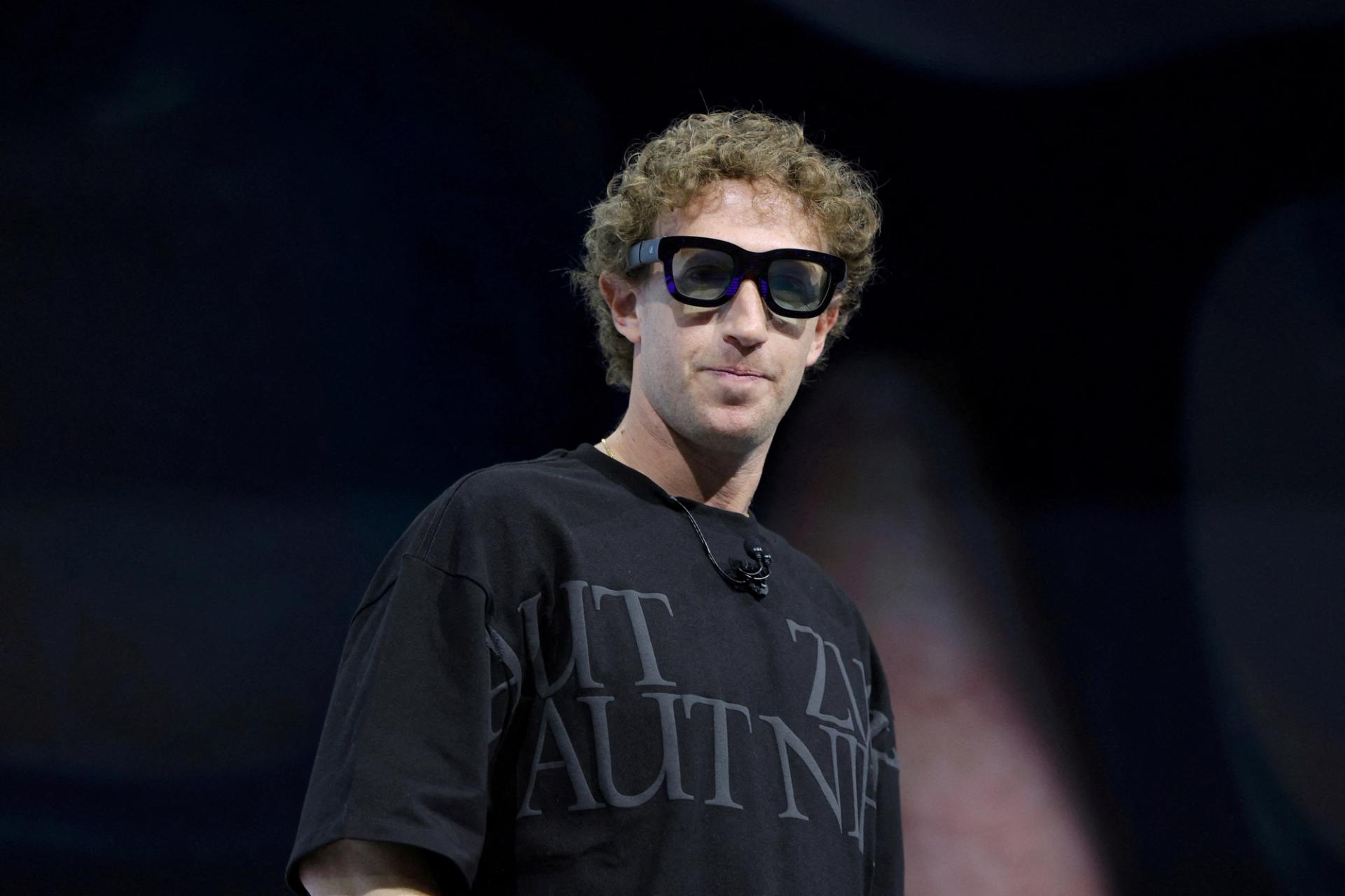 Meta CEO Mark Zuckerberg tries on Orion AR glasses at the Meta Connect annual event at the company’s headquarters in Menlo Park, California.