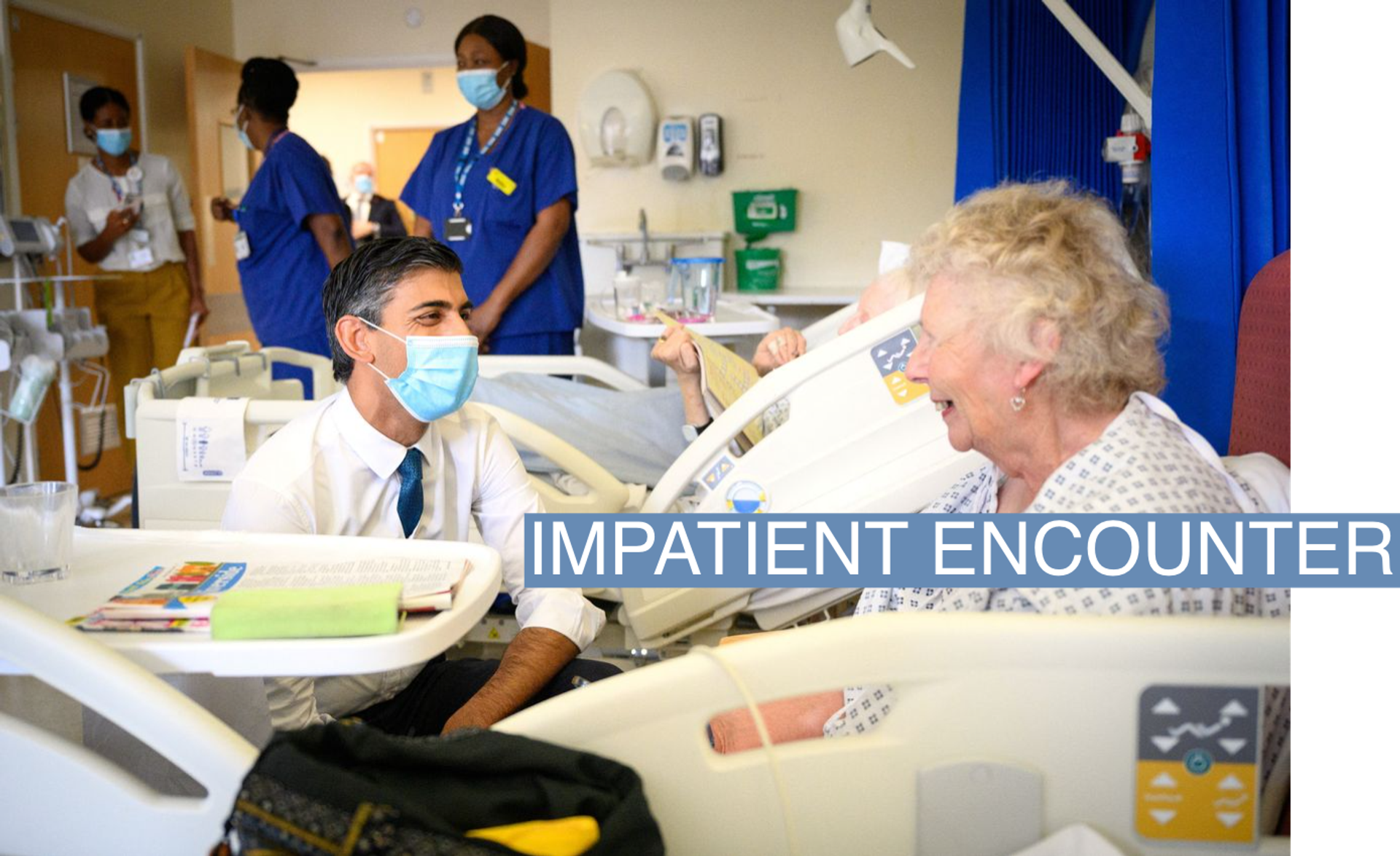 British Prime Minister Rishi Sunak speaks with patient Catherine Poole as he visits Croydon University Hospital on October 28, 2022 in London, Britain. 