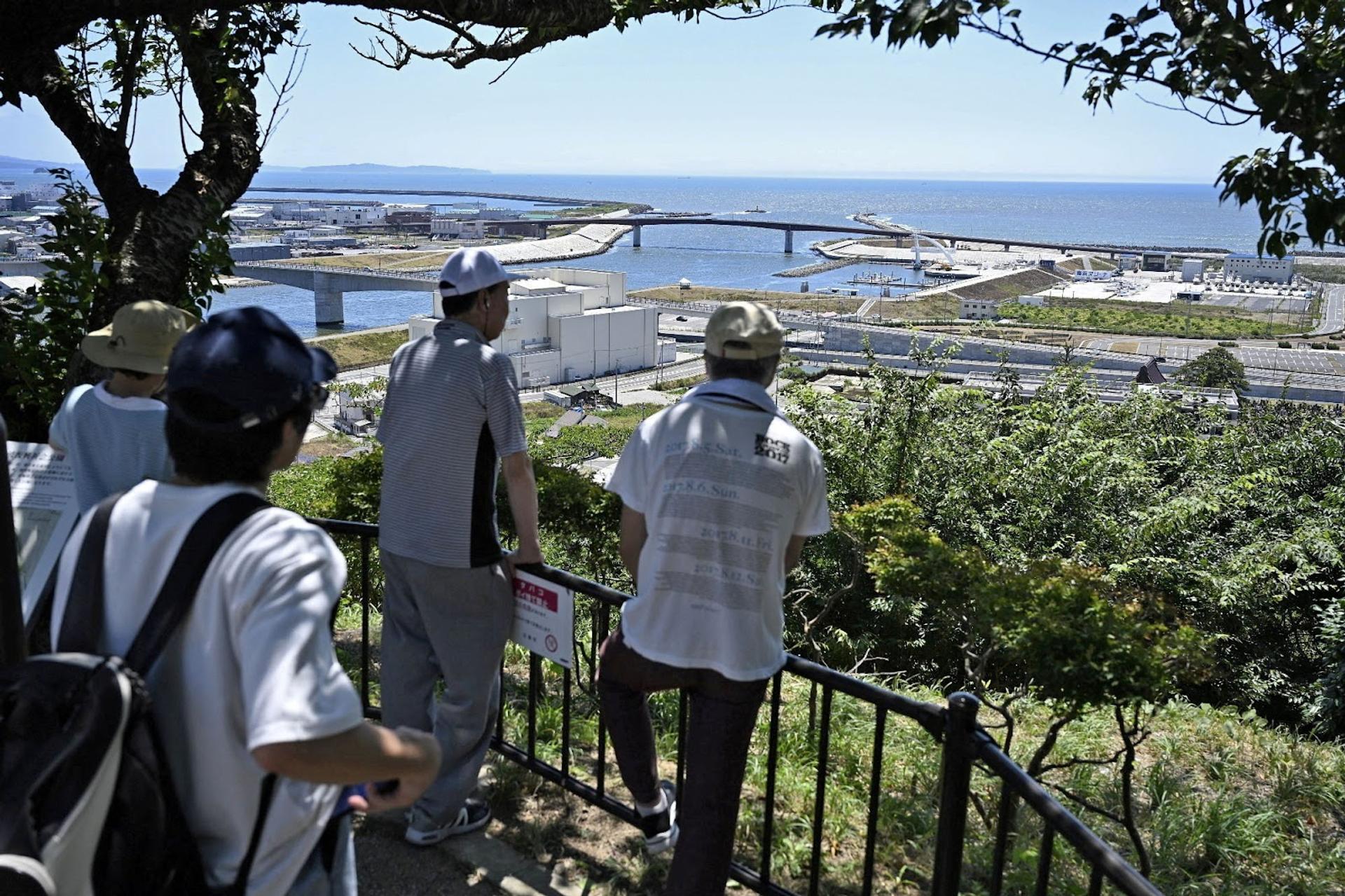 People standing on high ground in Japan