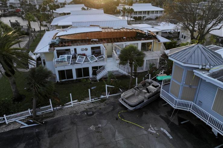 A drone view shows buildings and structures damaged by Hurricane Milton after it made landfall, in Venice, Florida