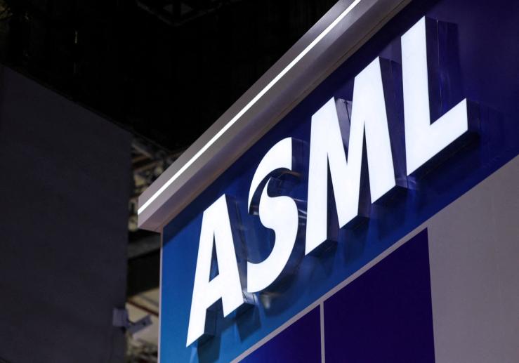 Logo of ASML is displayed at the company’s booth at the 8th China International Import Expo.