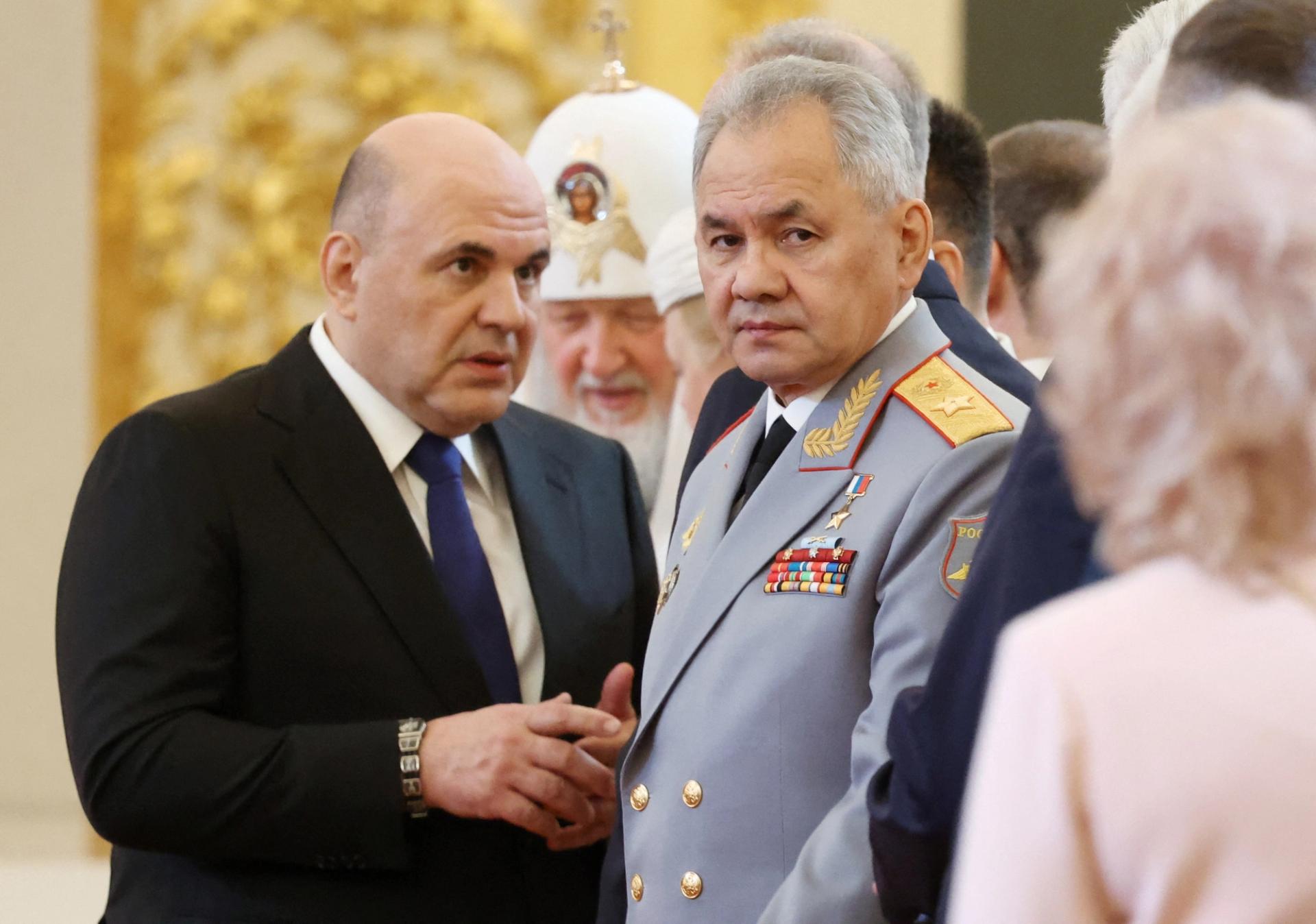Russian Prime Minister Mikhail Mishustin and Defence Minister Sergei Shoigu wait before a ceremony inaugurating Vladimir Putin as President of Russia at the Kremlin in Moscow, Russia May 7, 2024. Sputnik/Alexander Kazakov/Pool via REUTERS