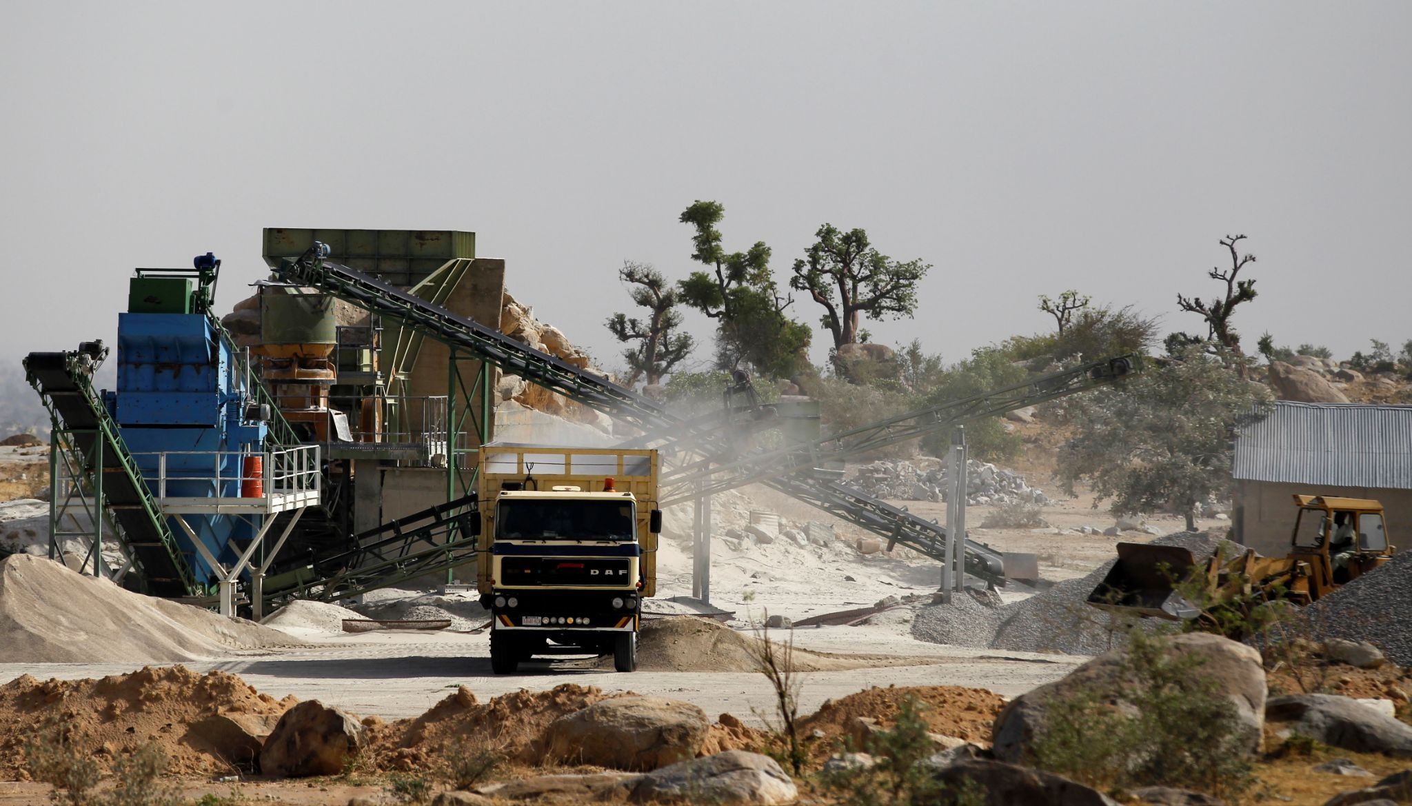 A truck is packed with crushed granite at a mining plant in Zamfara, Nigeria.