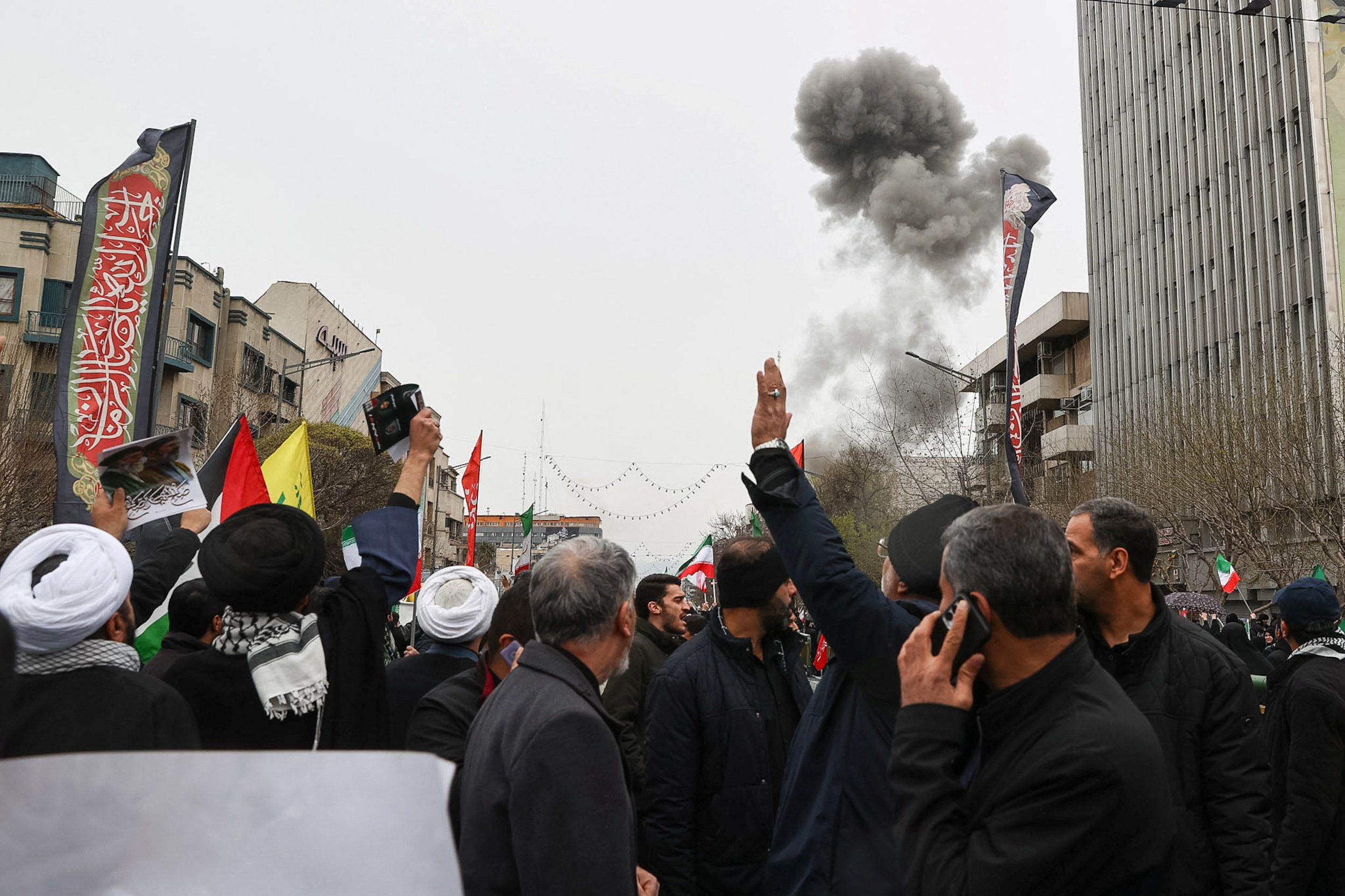 Smoke rises following an explosion during a protest marking the annual al-Quds Day (Jerusalem Day) on the last Friday of the holy month of Ramadan, amid the U.S.-Israeli conflict with Iran, in Tehran, Iran, March 13, 2026.