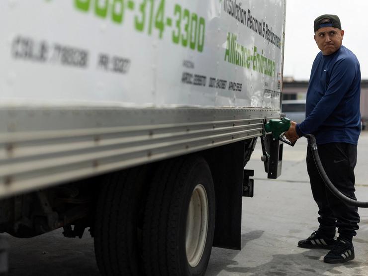 A man pumping diesel.