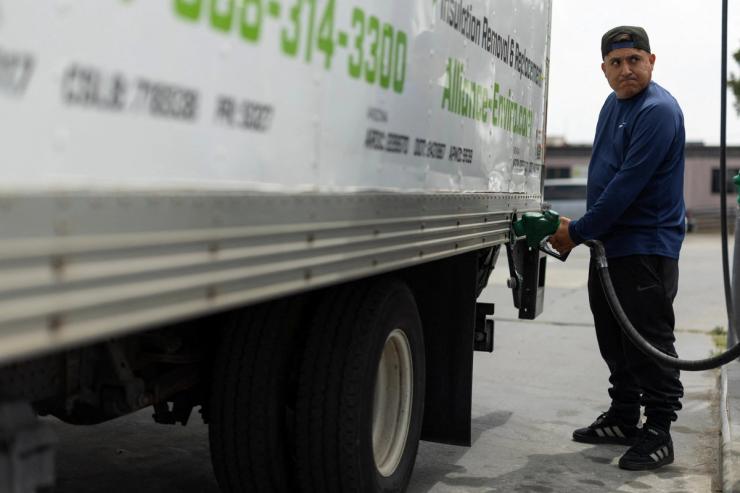 A man pumping diesel.