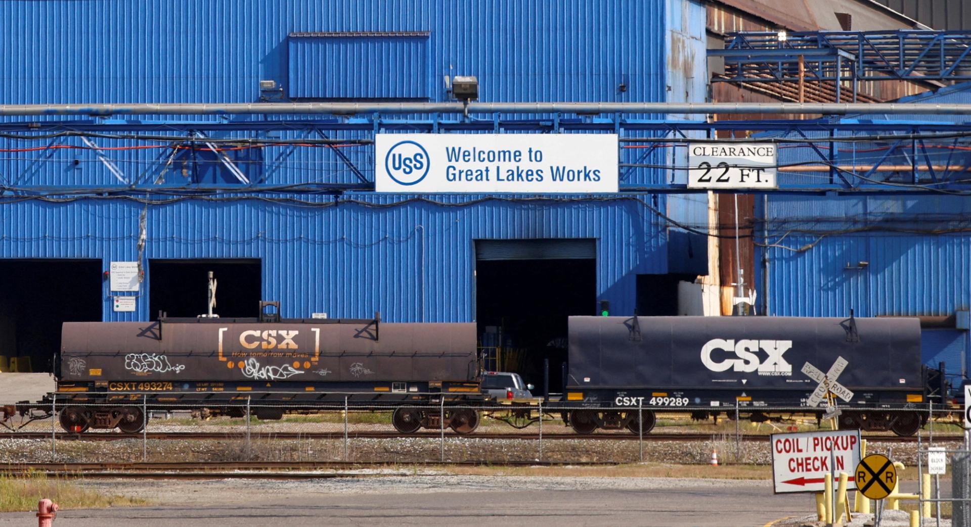 Train cars are seen in front of the Great Lakes Works United States Steel plant in River Rouge, Michigan.