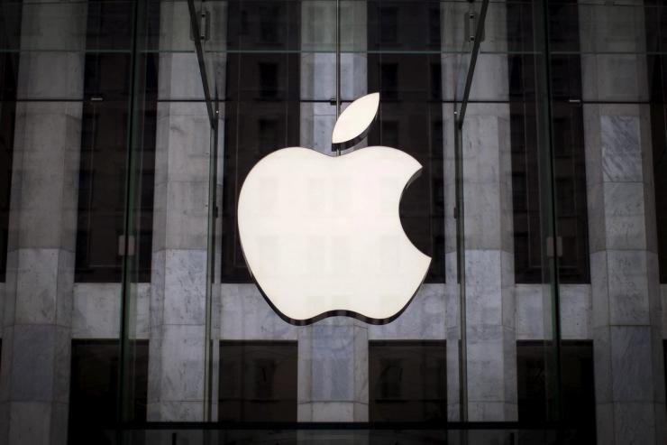 An Apple logo hangs above the entrance to the Apple store on 5th Avenue in the Manhattan borough of New York City.