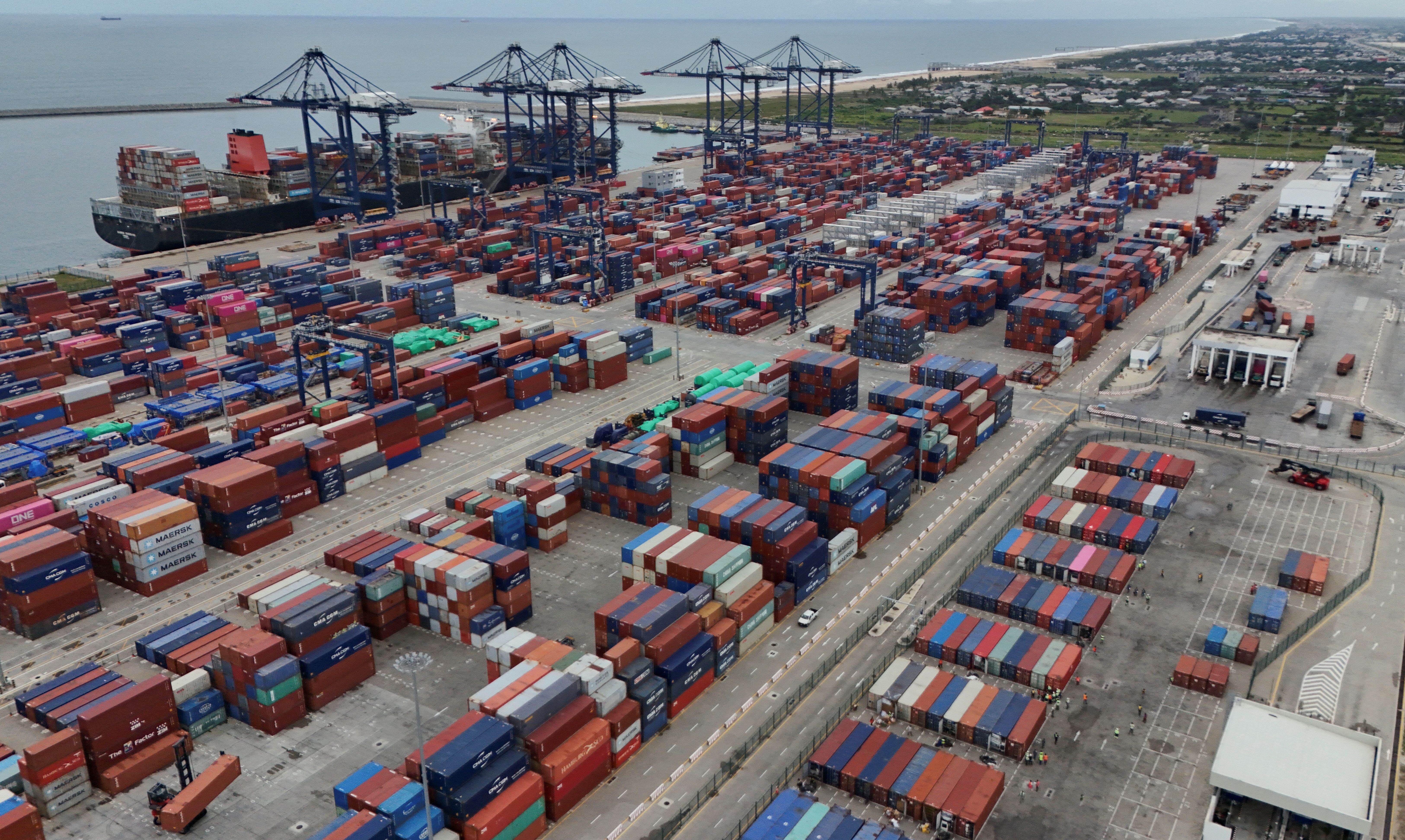 A drone view shows containers packed at an import and export section near the Atlantic shore of the Lekki Free Trade Zone.