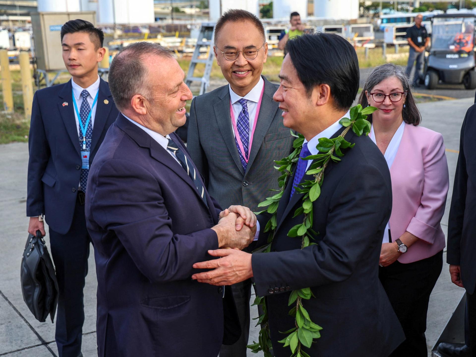 Hawaii Governor Josh Green shaking hands with Taiwanese President Lai Ching-te on his arrival in Honolulu.