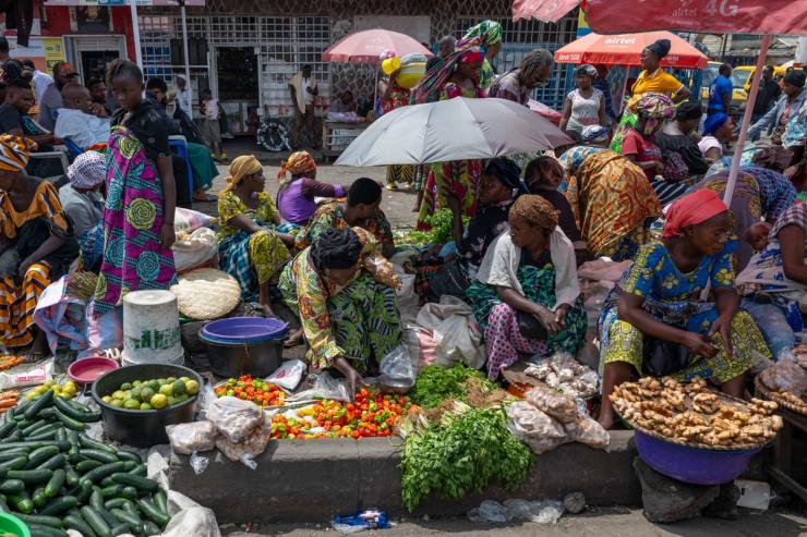 Vendors sell vegetables at a local market in Goma, DR Congo.
