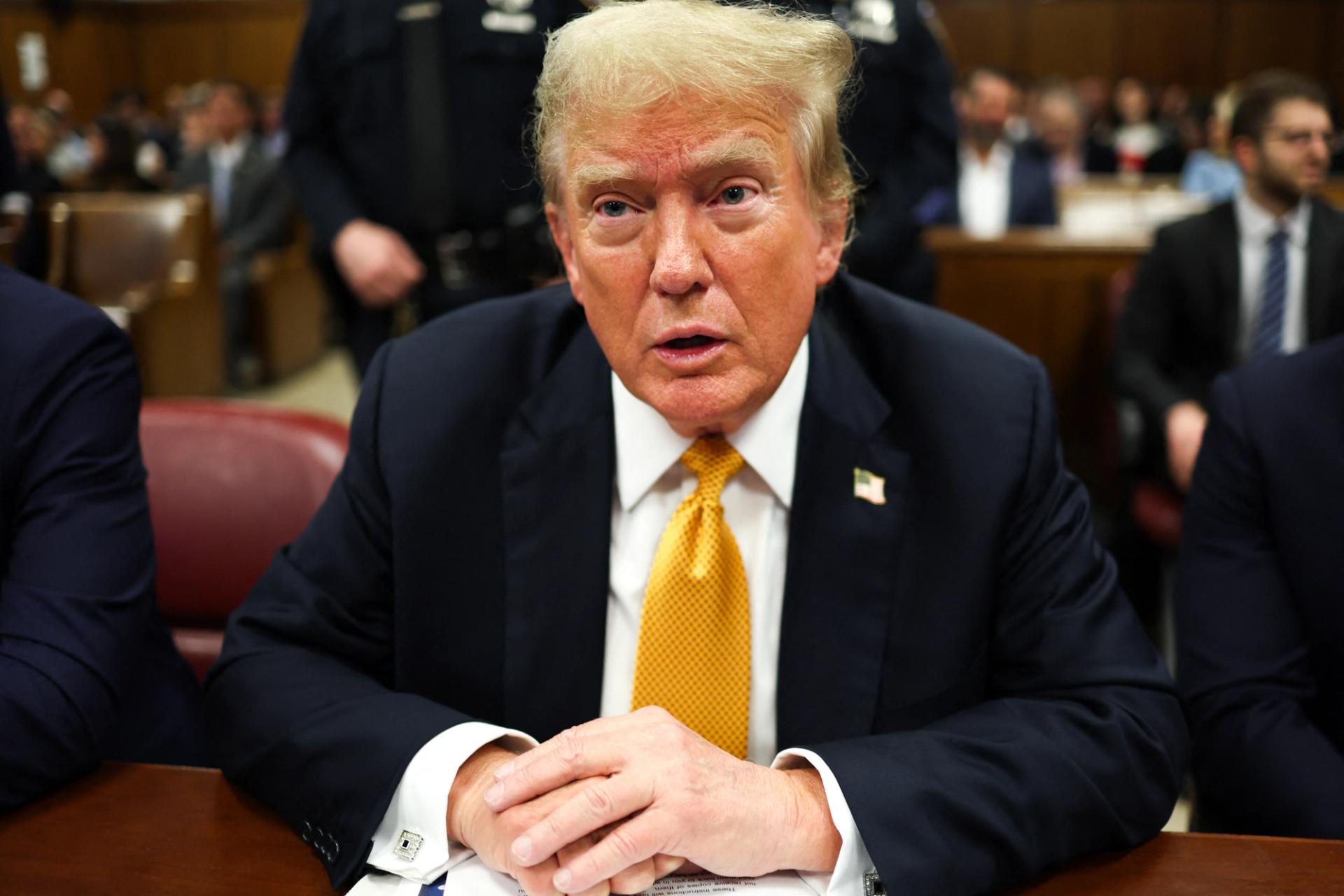 Former US President and Republican presidential candidate Donald Trump awaits the start of proceedings in his criminal trial at Manhattan Criminal Court in New York City, on May 29, 2024