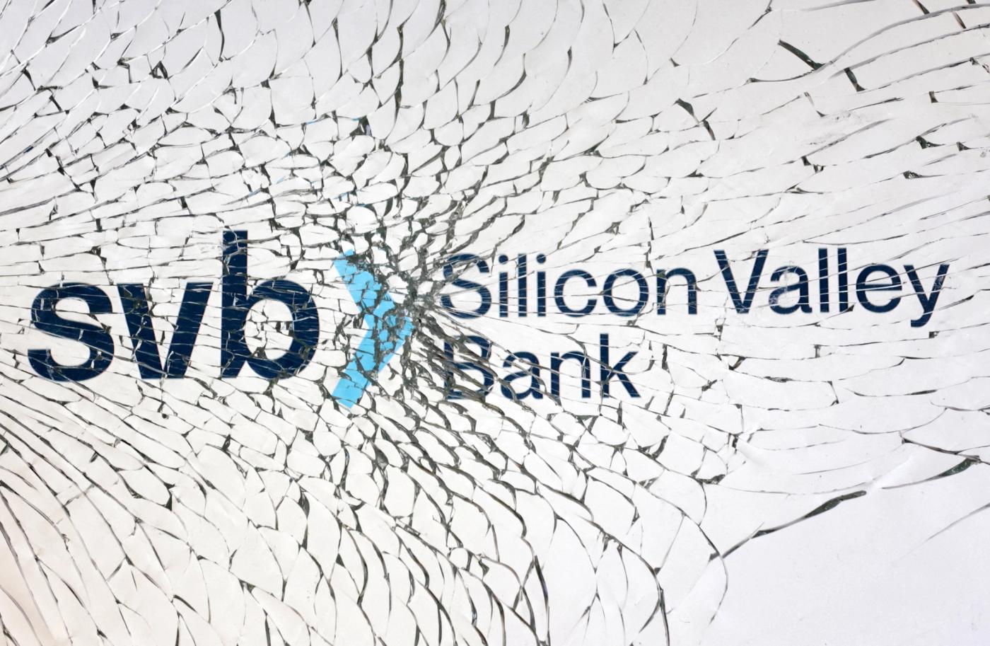 SVB (Silicon Valley Bank) logo is seen through broken glass in this illustration taken March 10, 2023. 