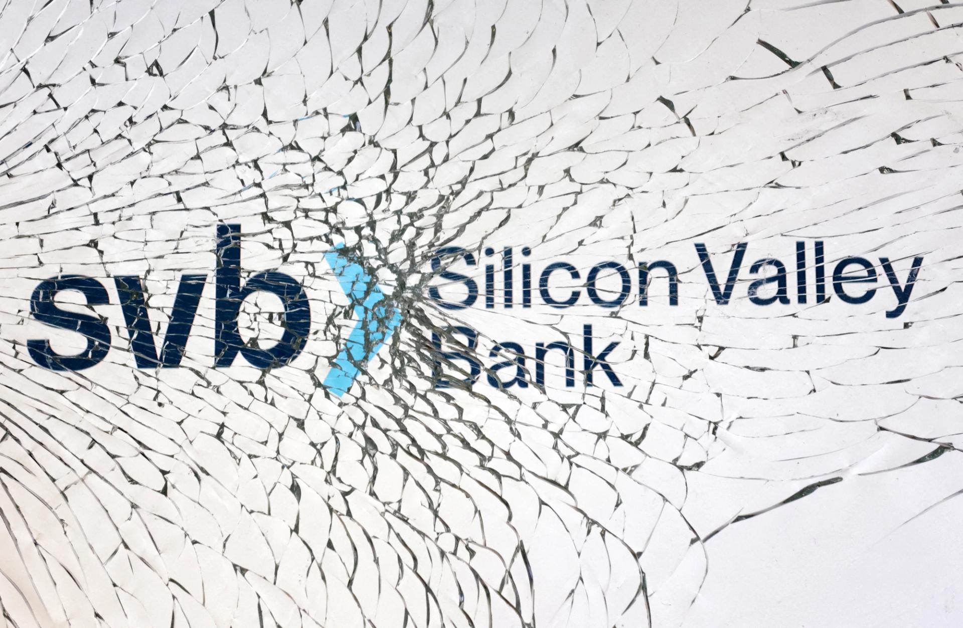SVB (Silicon Valley Bank) logo is seen through broken glass in this illustration taken March 10, 2023. 