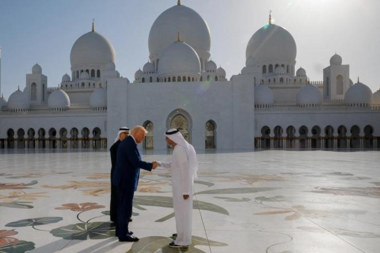 US President Donald Trump shakes hands with Yousif Al Obaidli, director of Sheikh Zayed Grand Mosque.
