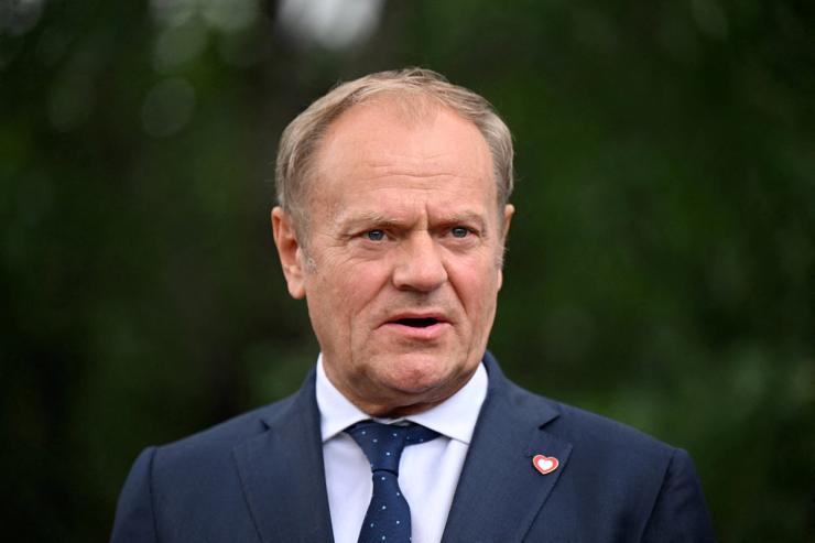 Poland’s Prime Minister Donald Tusk talks to the press after their meeting on May 16, 2025 in Tirana, Albania.