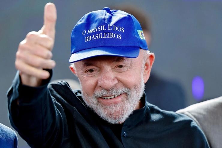 Brazil’s President Luiz Inacio Lula da Silva wears a cap that reads “Brazil belongs to the Brazilians.”