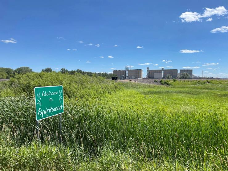 Grain silos tower over the construction site of an ADM soybean processing plant in Spiritwood, North Dakota.