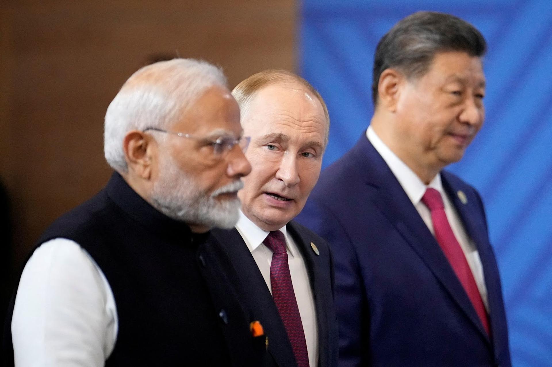 Indian Prime Minister Narendra Modi, Russian President Vladimir Putin and Chinese President Xi Jinping. 