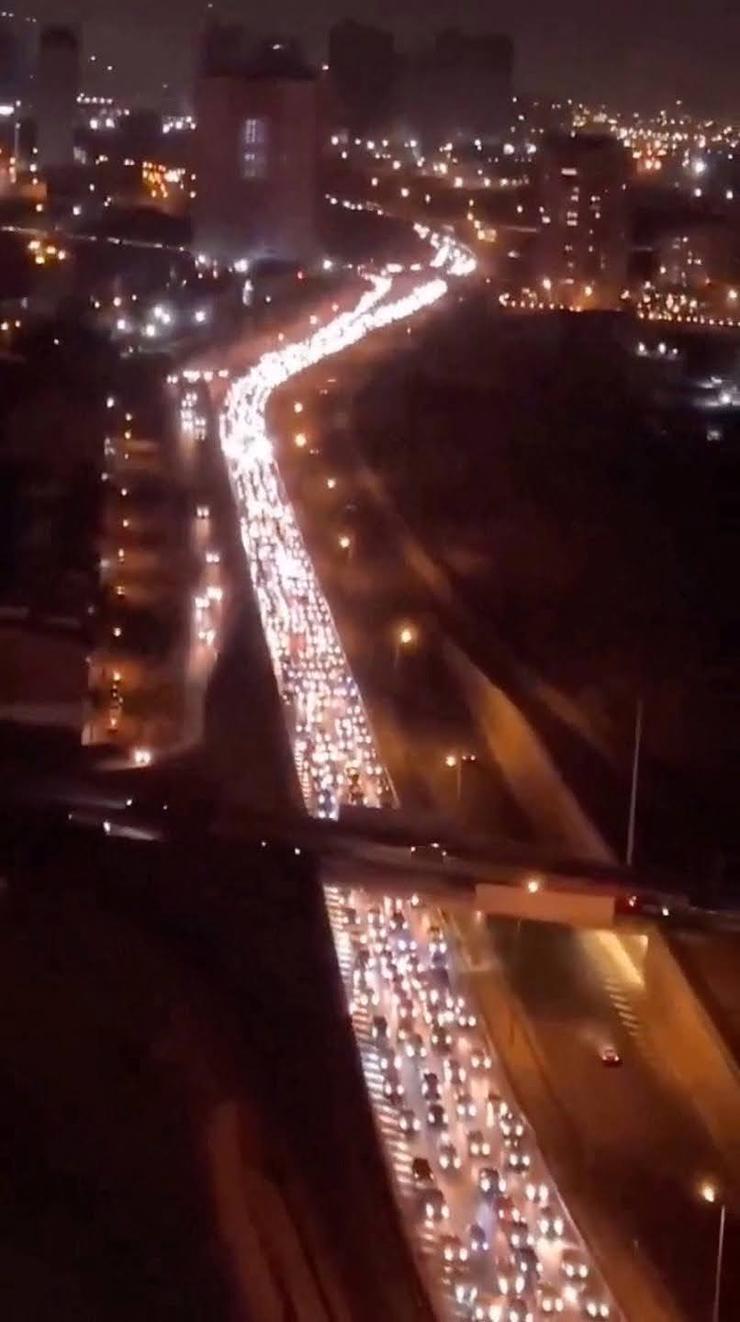 Cars leaving Tehran.