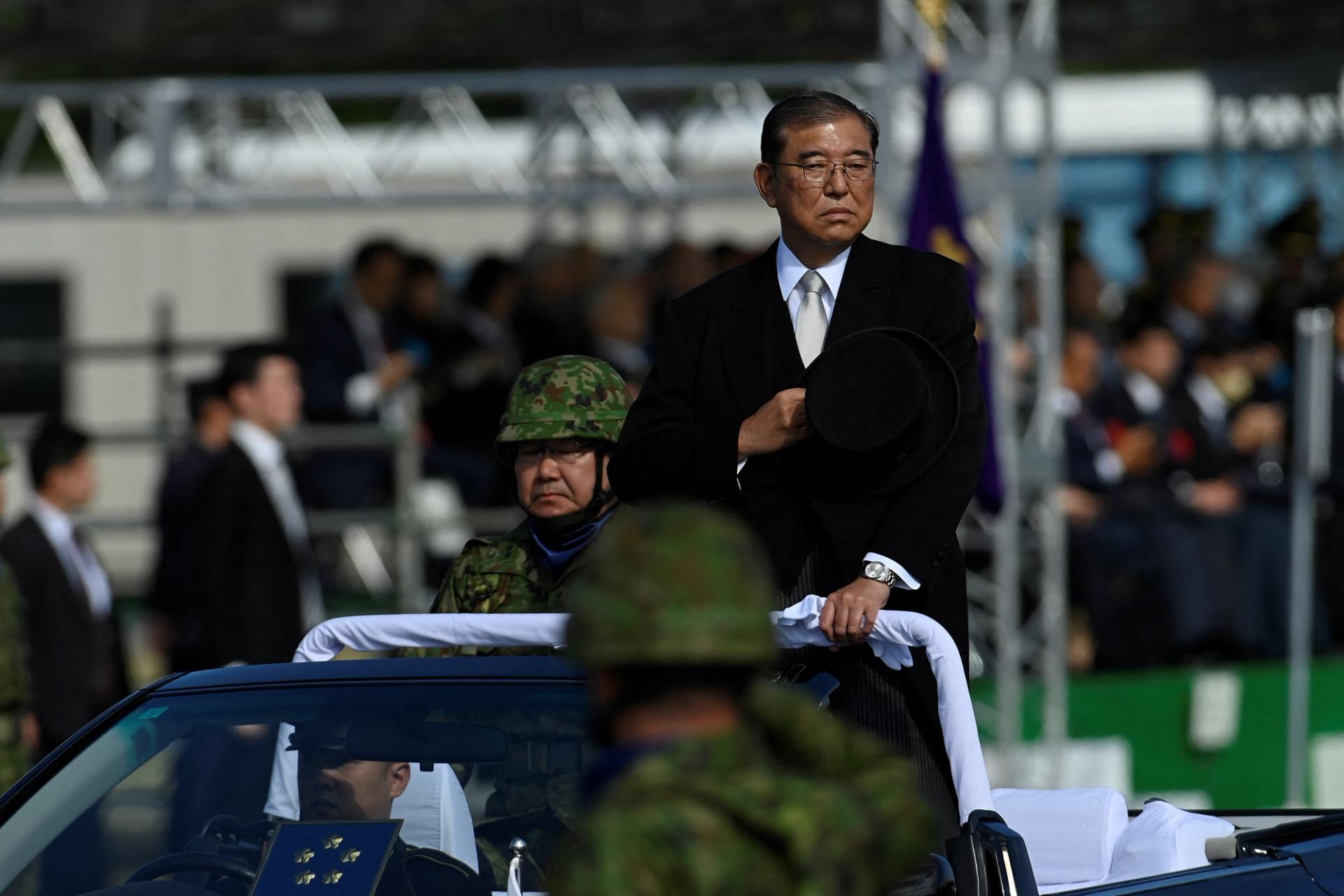 Japanese Prime Minister Shigeru Ishiba reviews the Japan Self-Defense Forces troops.