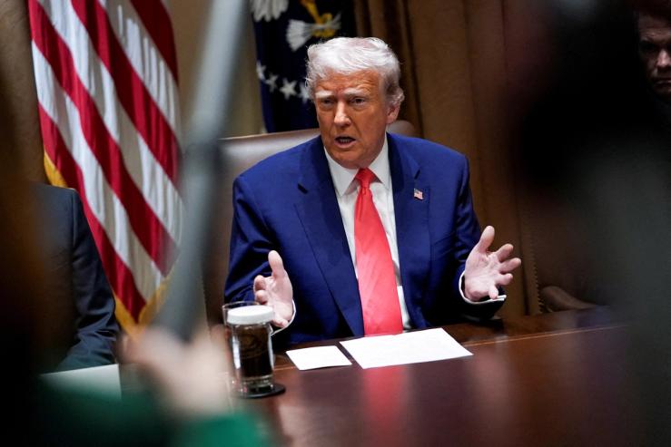 US President Donald Trump attends a cabinet meeting at the White House in Washington, April 10.