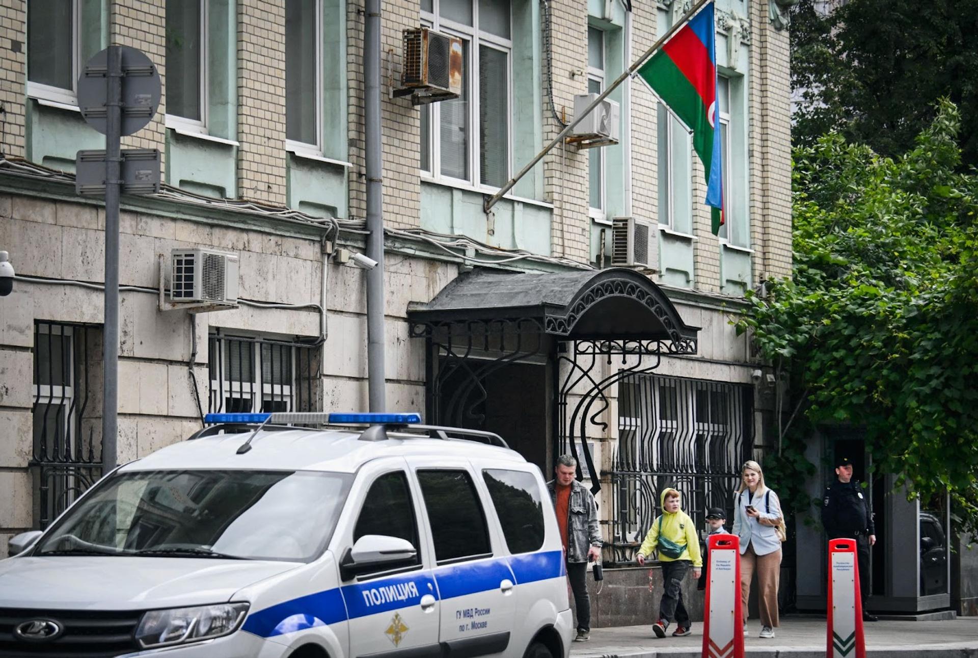 People walk past Azerbaijan’s embassy in Moscow on July 2, 2025. 