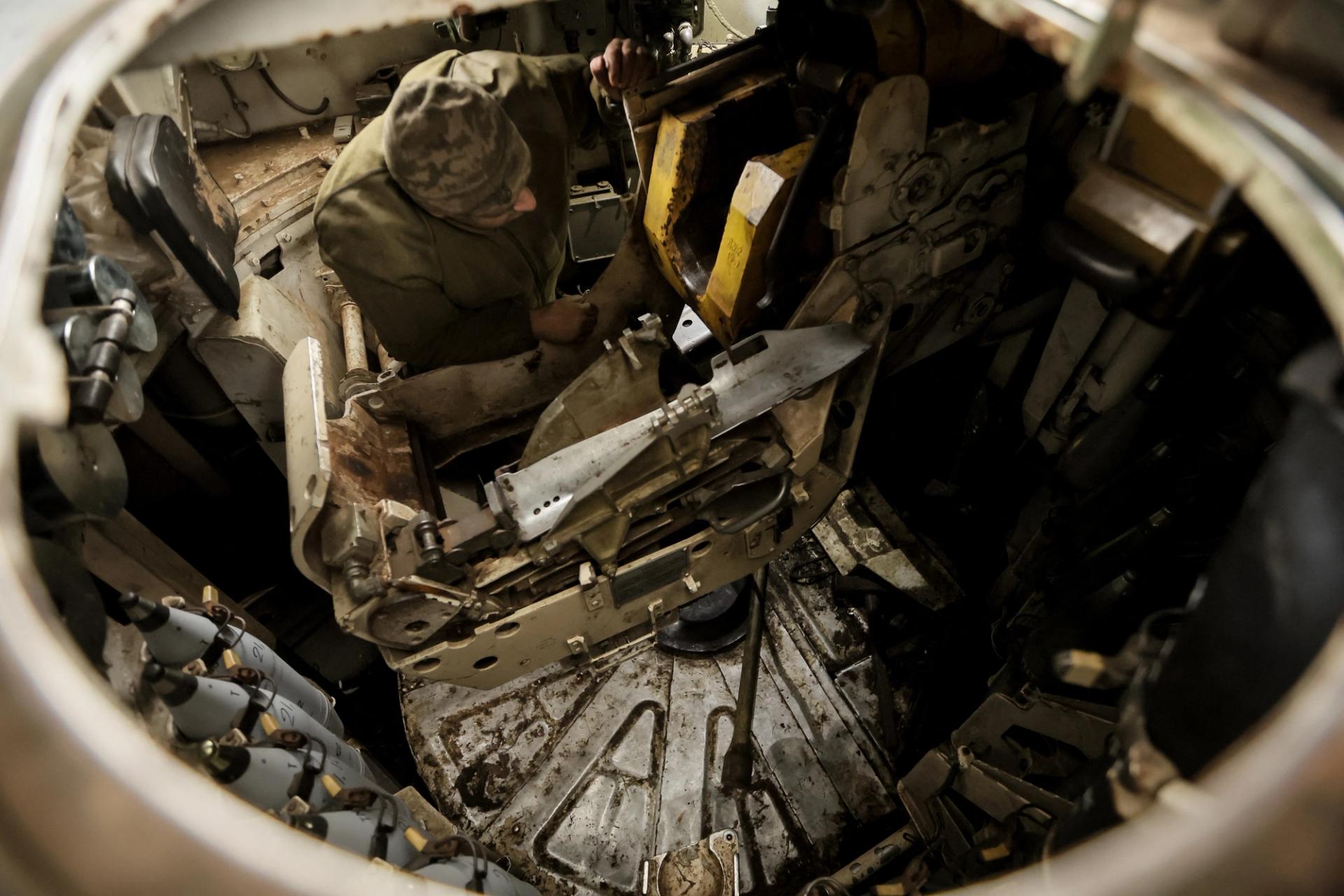 A Ukrainian soldier prepares to fire a howitzer near the town of Chasiv Yar, Ukraine, Nov. 13. 