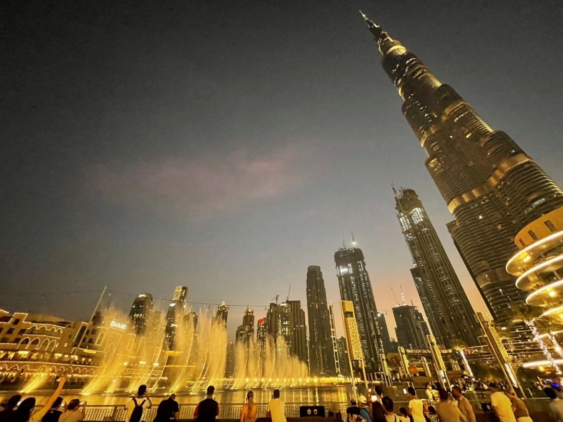 The Dubai fountain at night.