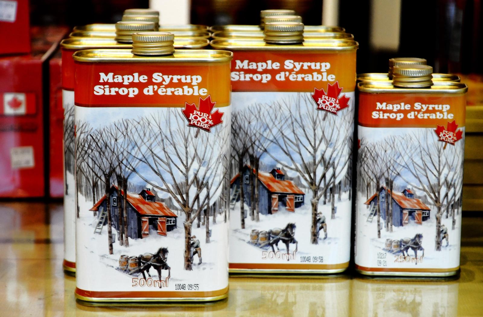 Maple syrup cans at Jean Lesage International Airport. Quebec, Canada