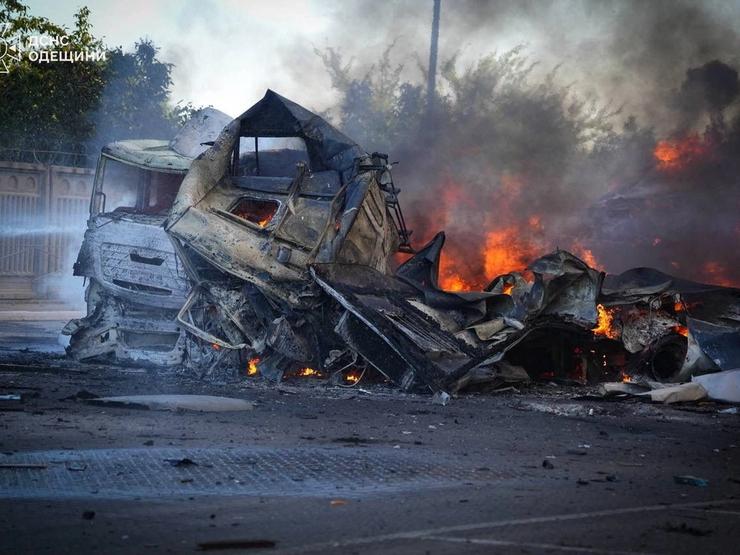 Vehicles burn at a site after Russia attacked energy infrastructure facilities, according to Ukraine’s energy ministry.