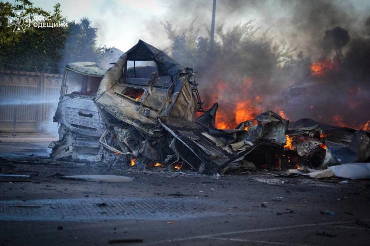 Vehicles burn at a site after Russia attacked energy infrastructure facilities, according to Ukraine’s energy ministry.