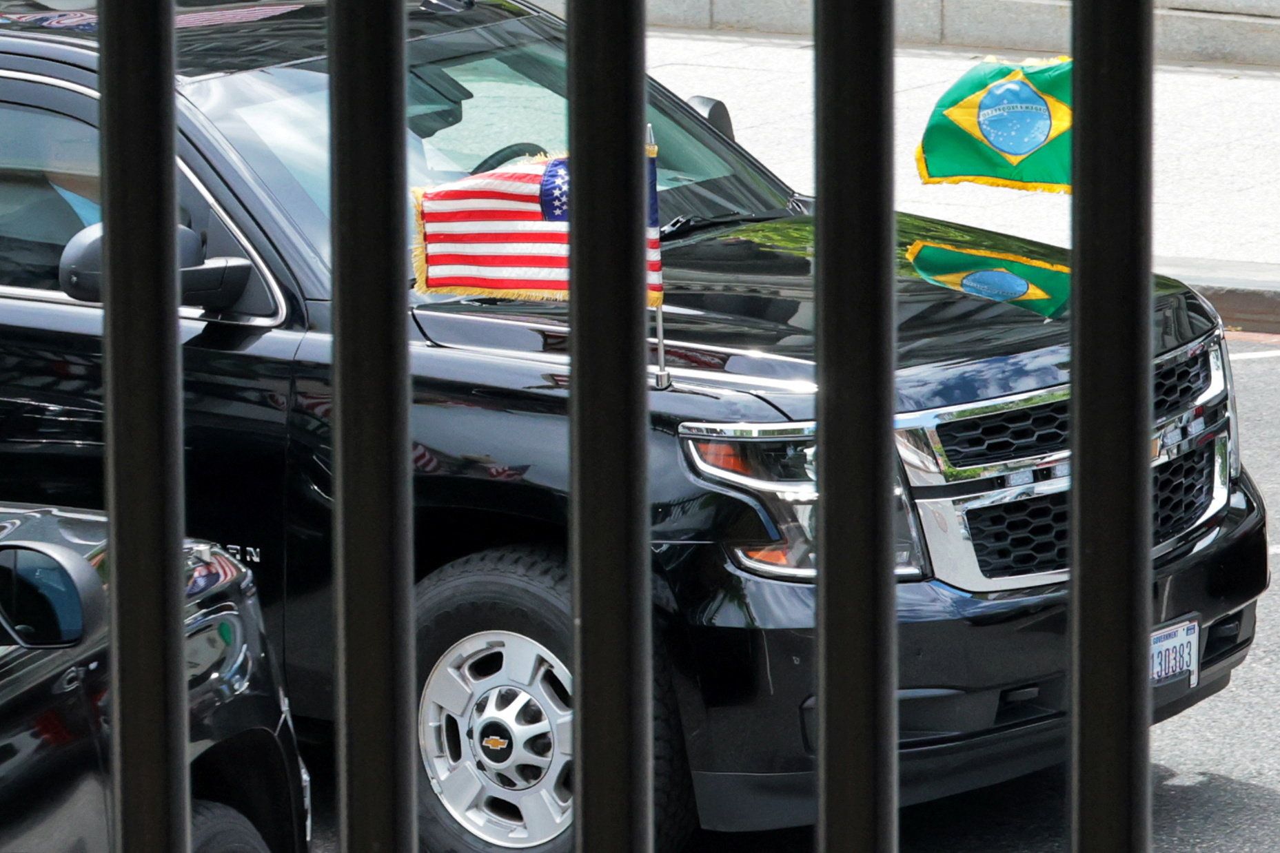The vehicle carrying Brazilian President Luiz Inacio Lula da Silva departs the White House