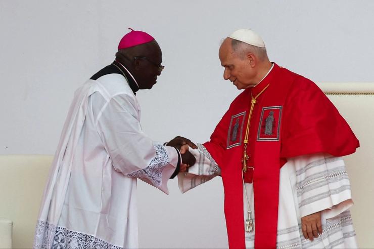 Pope Leo XIV shakes hands with Bishop Monsignor Emilio Sumbelelo in Muxima, Angola on 19 April 2026.