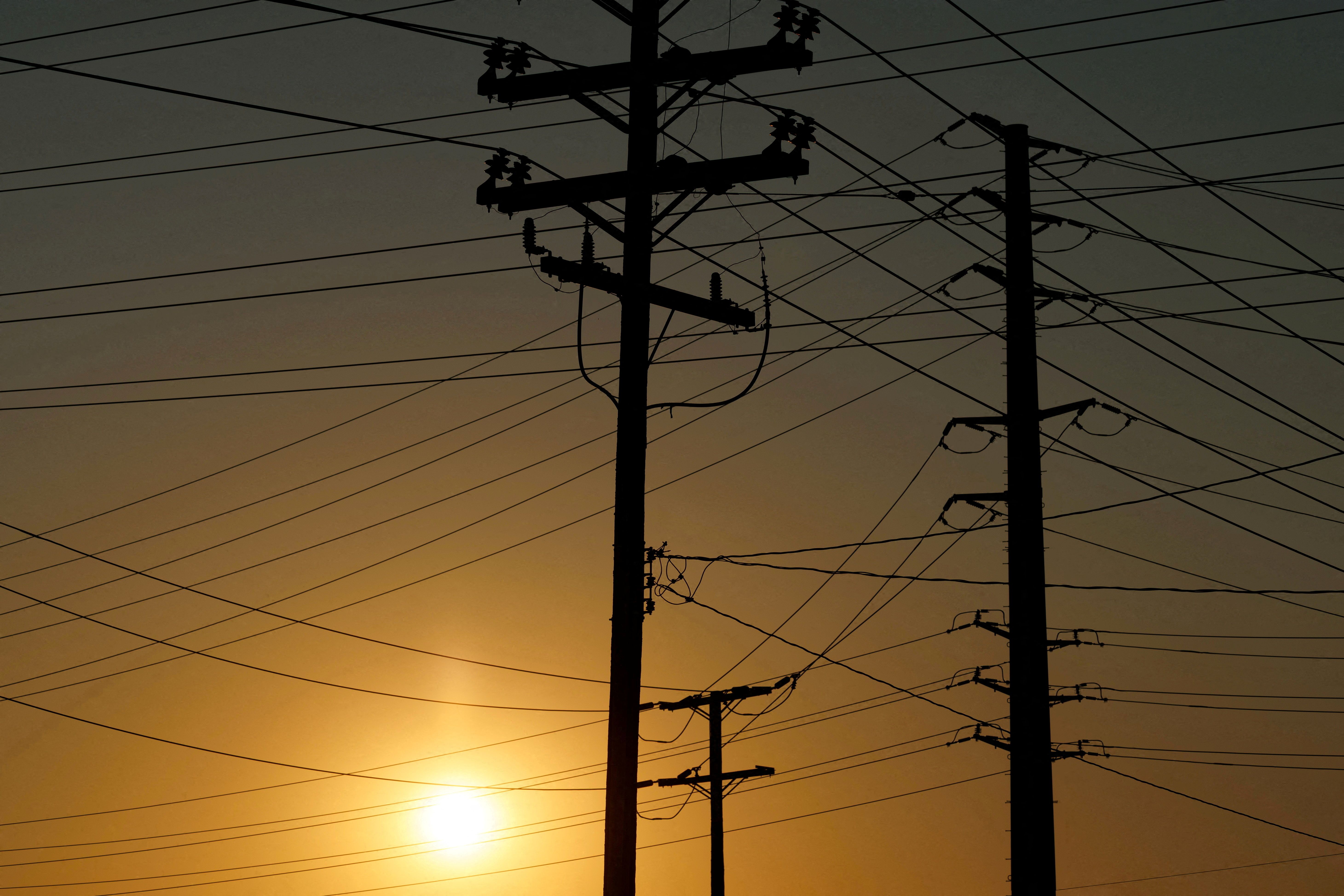 Electrical transmission towers, poles and lines in Commerce, CA.
