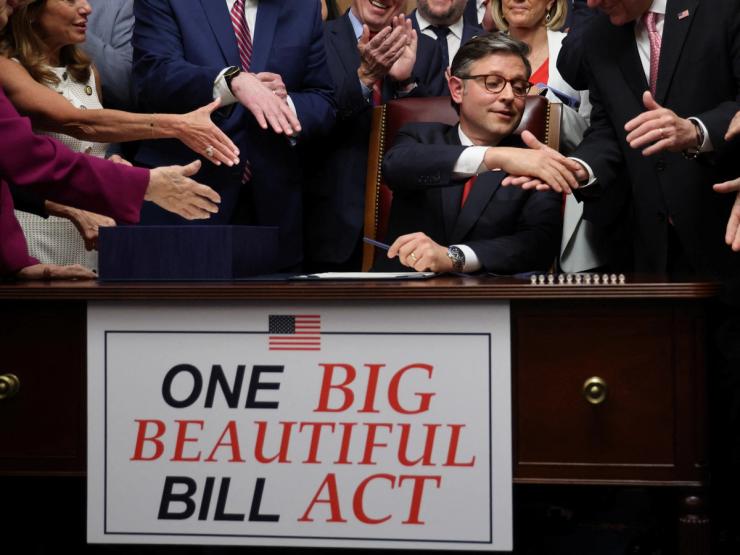 Mike Johnson shakes hands