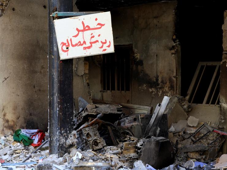Debris lies at the site of a residential building damaged by a strike on March 4, in Tehran, Iran.
