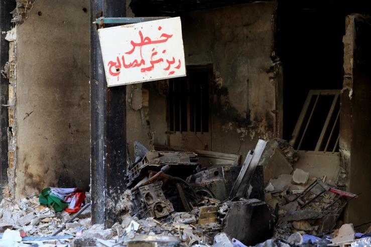 Debris lies at the site of a residential building damaged by a strike on March 4, in Tehran, Iran.