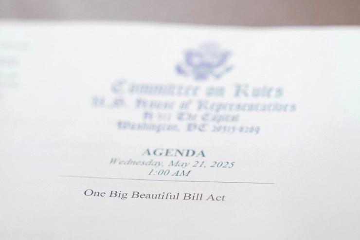 A view of an agenda with the words “One Big Beautiful Bill Act” printed on it.