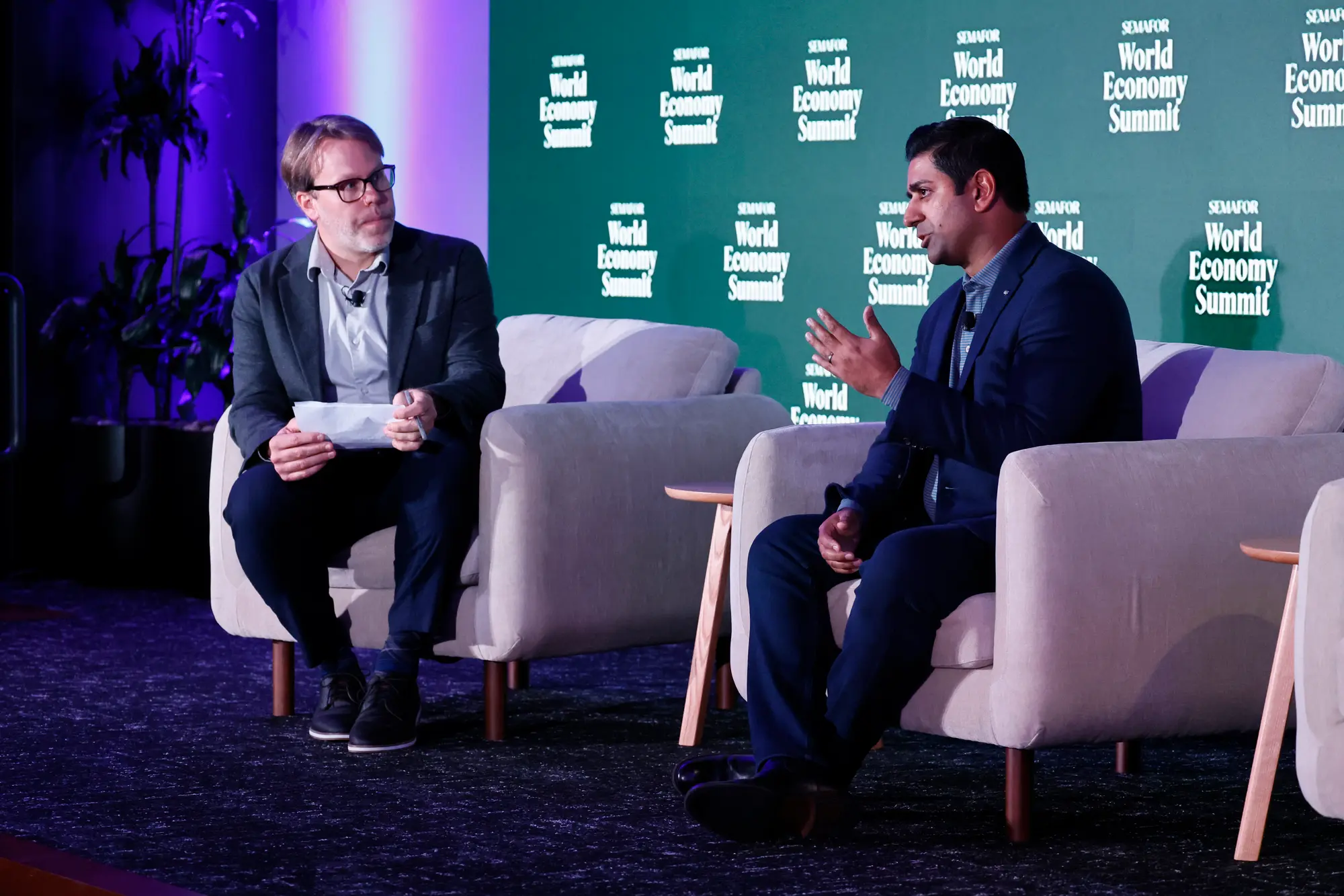 Reed Albergotti, Technology Editor, Semafor and Sarfraz Maredia, Head of Autonomous Mobility & Delivery, Uber speak onstage during the Semafor World Economy Summit Fall Edition.