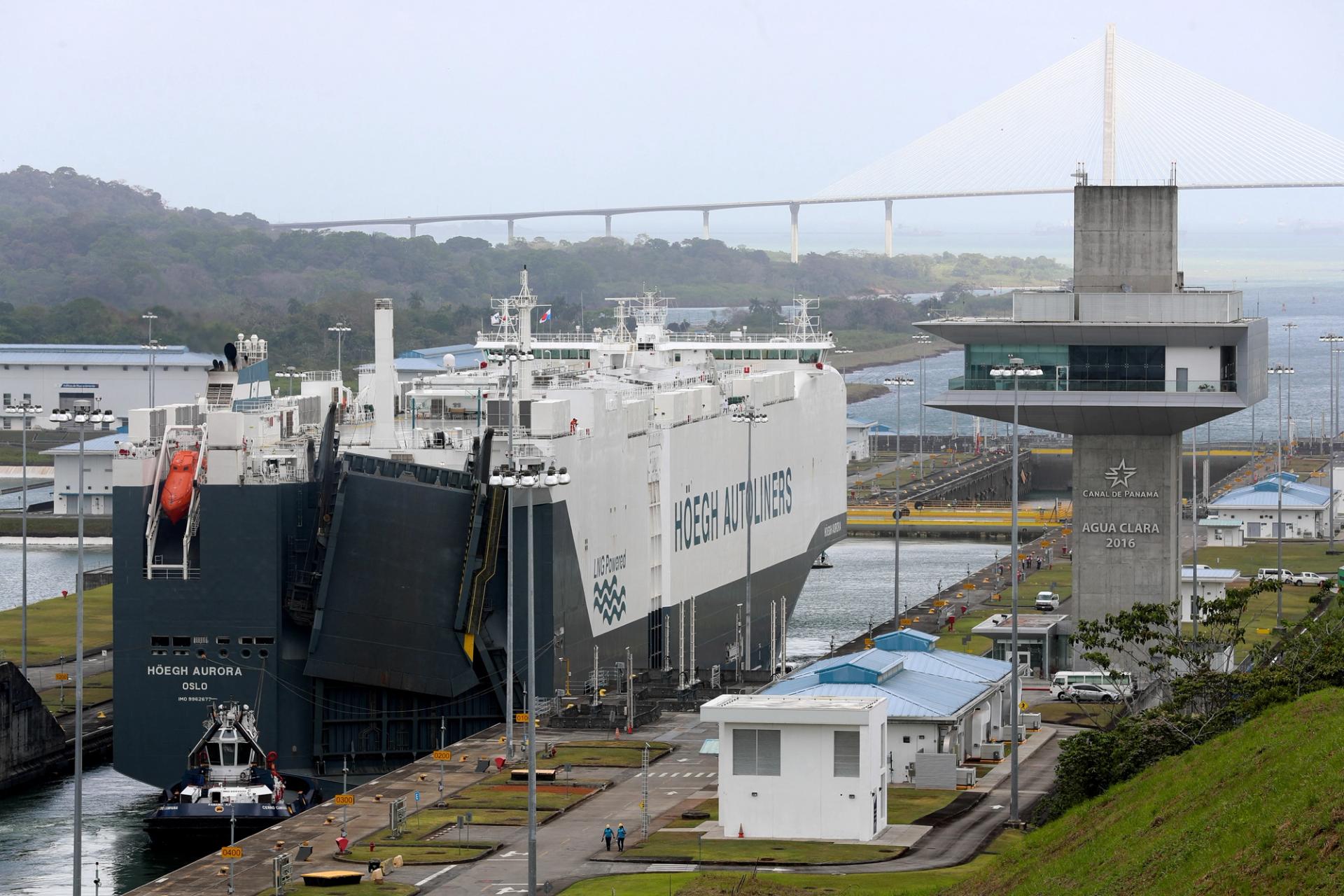 Multi-fuel vehicle carrier Hoegh Aurora, sailing under the flag of Norway, transits the Panama Canal in Panama City. 