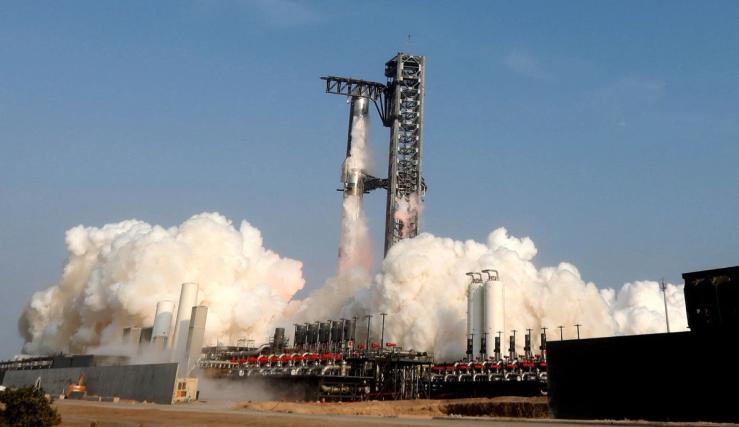 SpaceX’s next-generation Starship spacecraft atop its Super Heavy booster is launched on its ninth test at the company’s launch pad in Starbase.