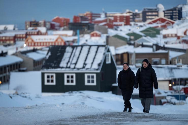 People walking in Nuuk, Greenland.