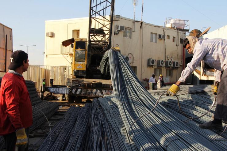 Foreign labourers work at a construction site in Riyadh, November 23, 2011.