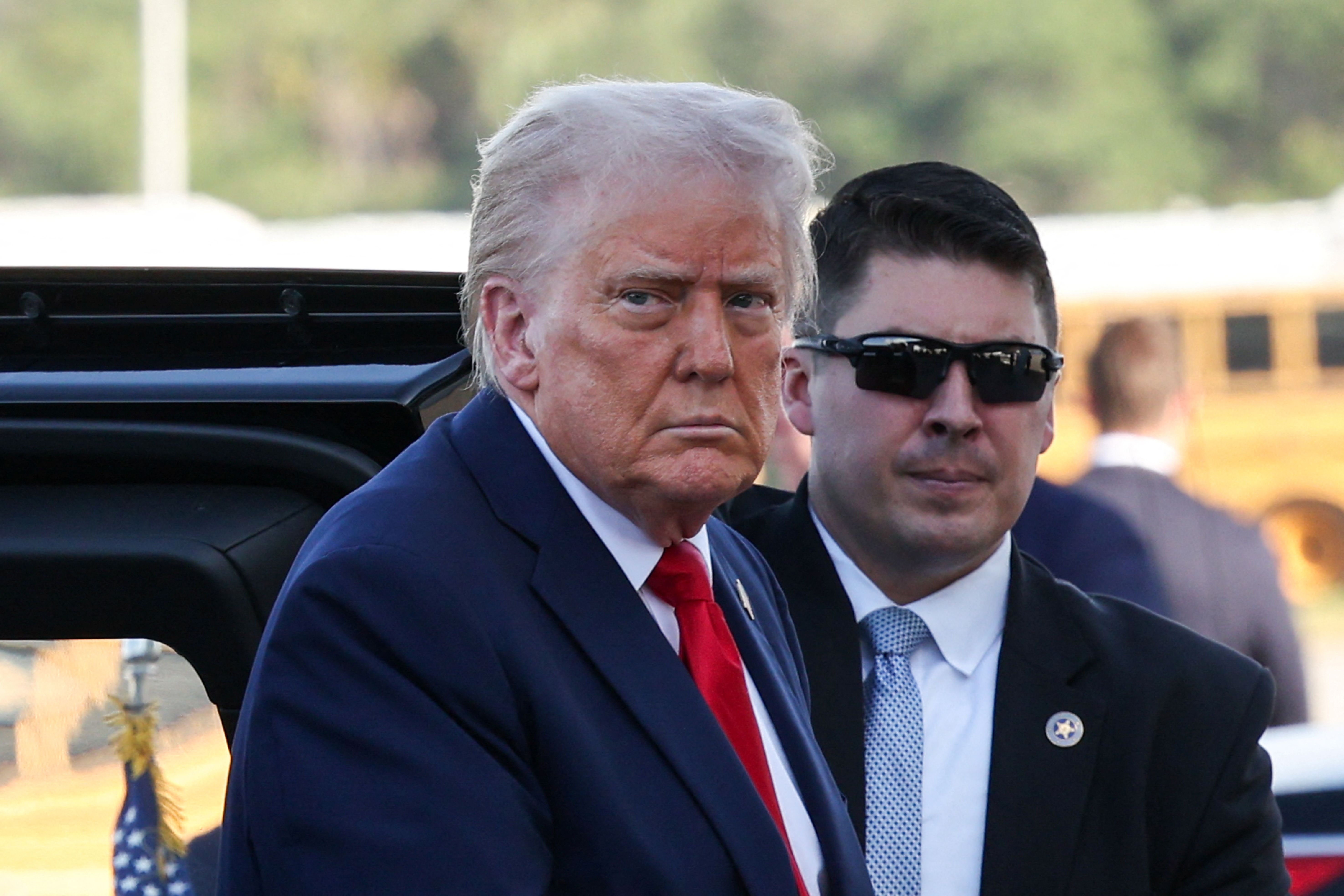 U.S. President Donald Trump looks on before he departs for Washington, from West Palm Beach, Florida, US.