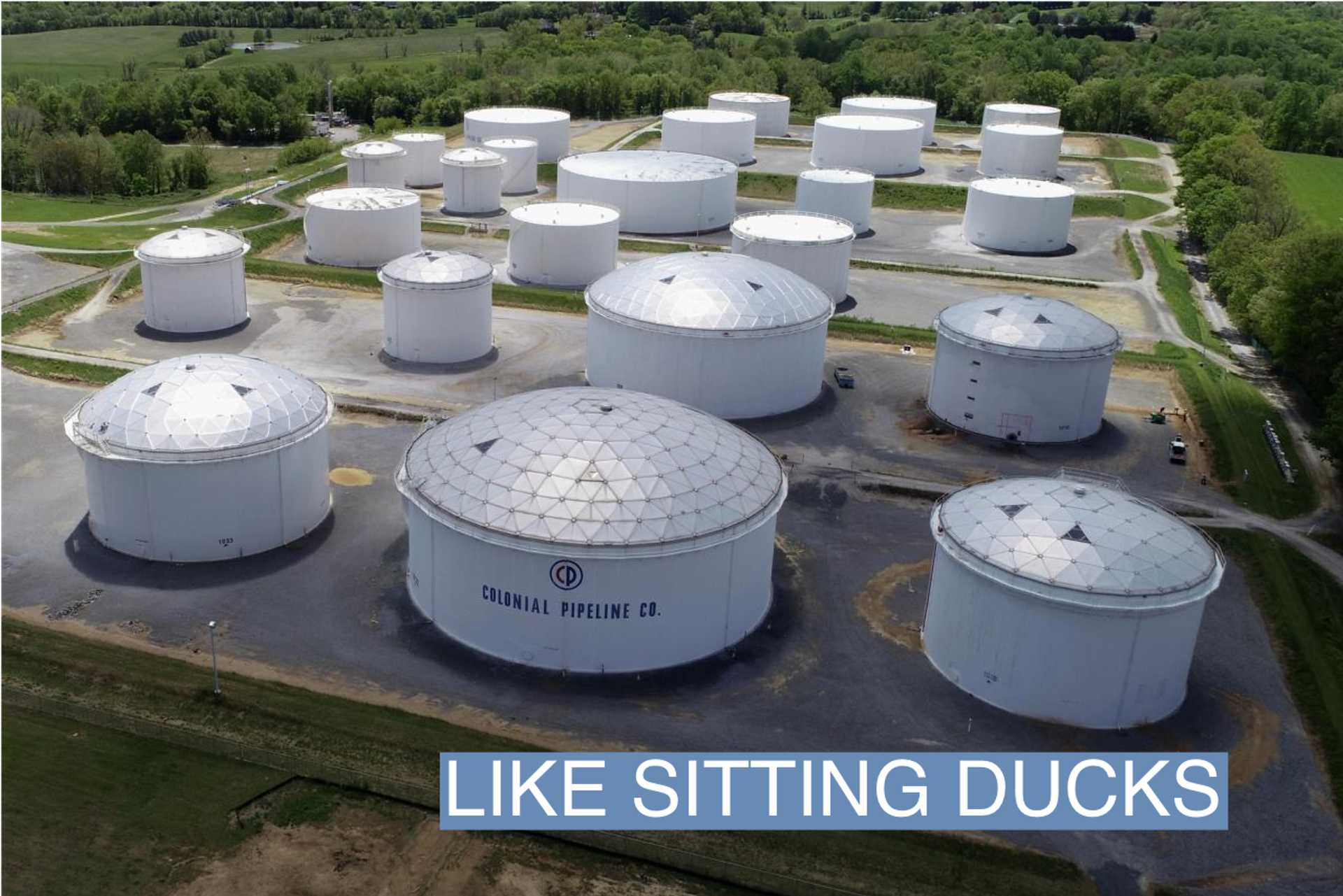 Holding tanks are seen in an aerial photograph at Colonial Pipeline's Dorsey Junction Station in Woodbine, Maryland, U.S. May 10, 2021. 